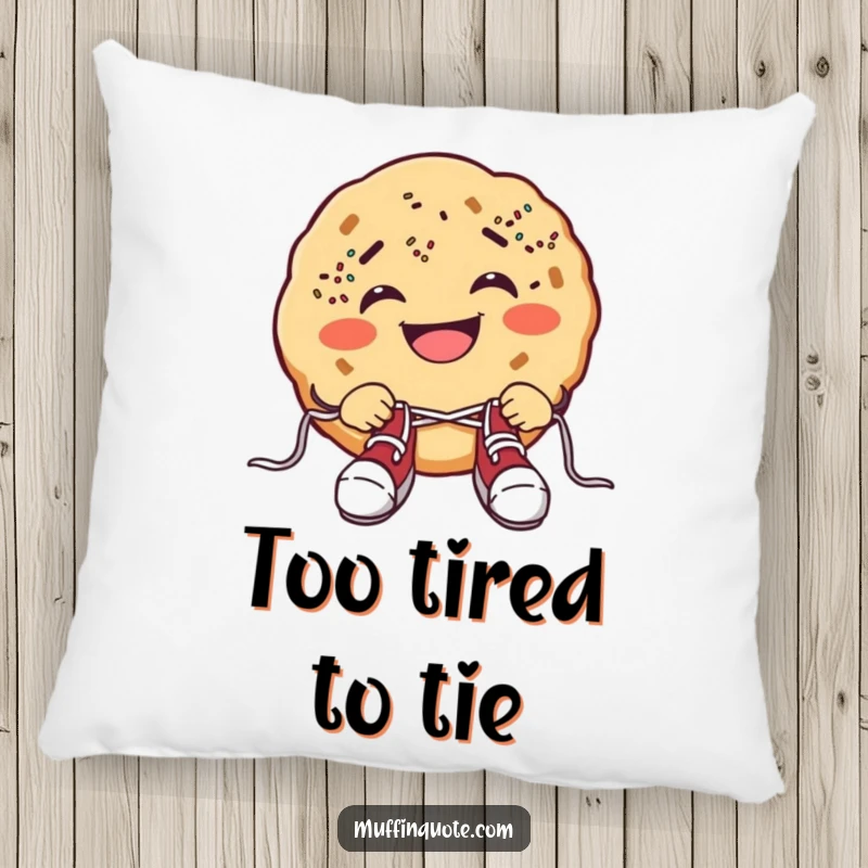 Funny cookie pillow with a grinning cookie, sprinkle freckles, and shoelace tying struggle, providing soft, comical comfort.