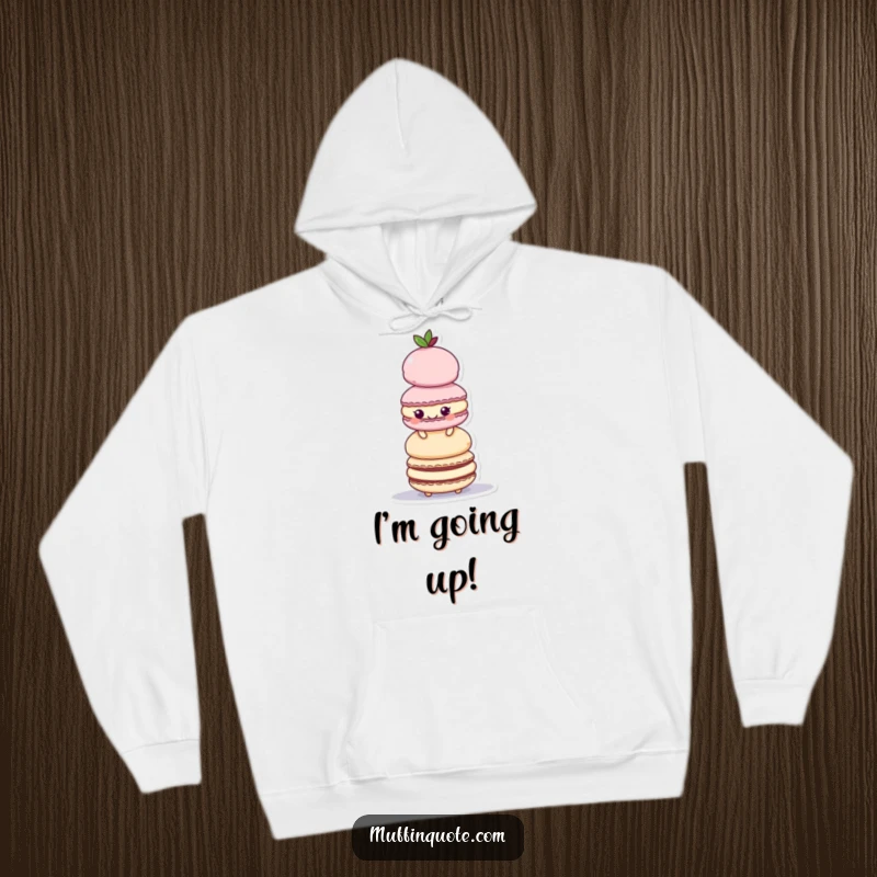 Funny Hoodie: A playful macaroon character happily builds a tall tower of colorful treats.