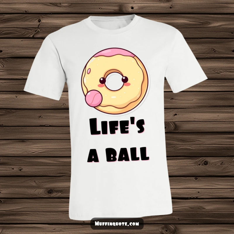 Funny and cheerful donut character joyfully bouncing a ball, featured on this vibrant t-shirt, perfect for fun lovers.
